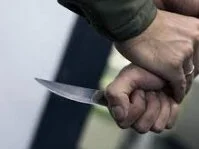 Нож в руке. Фото: